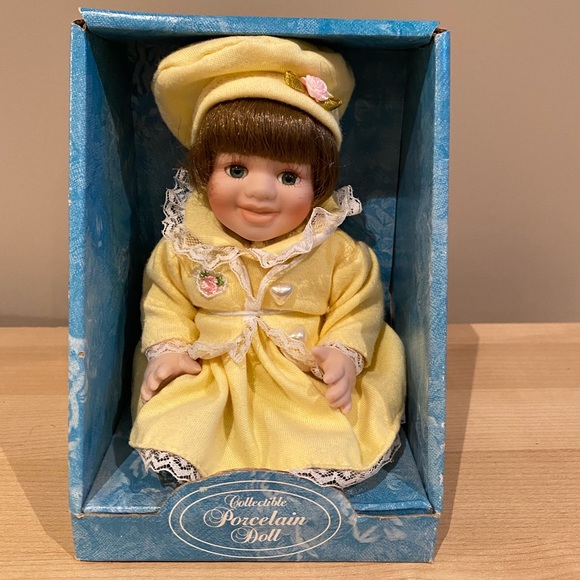 Porcelain Yellow Baby Doll - Picture 2 of 6